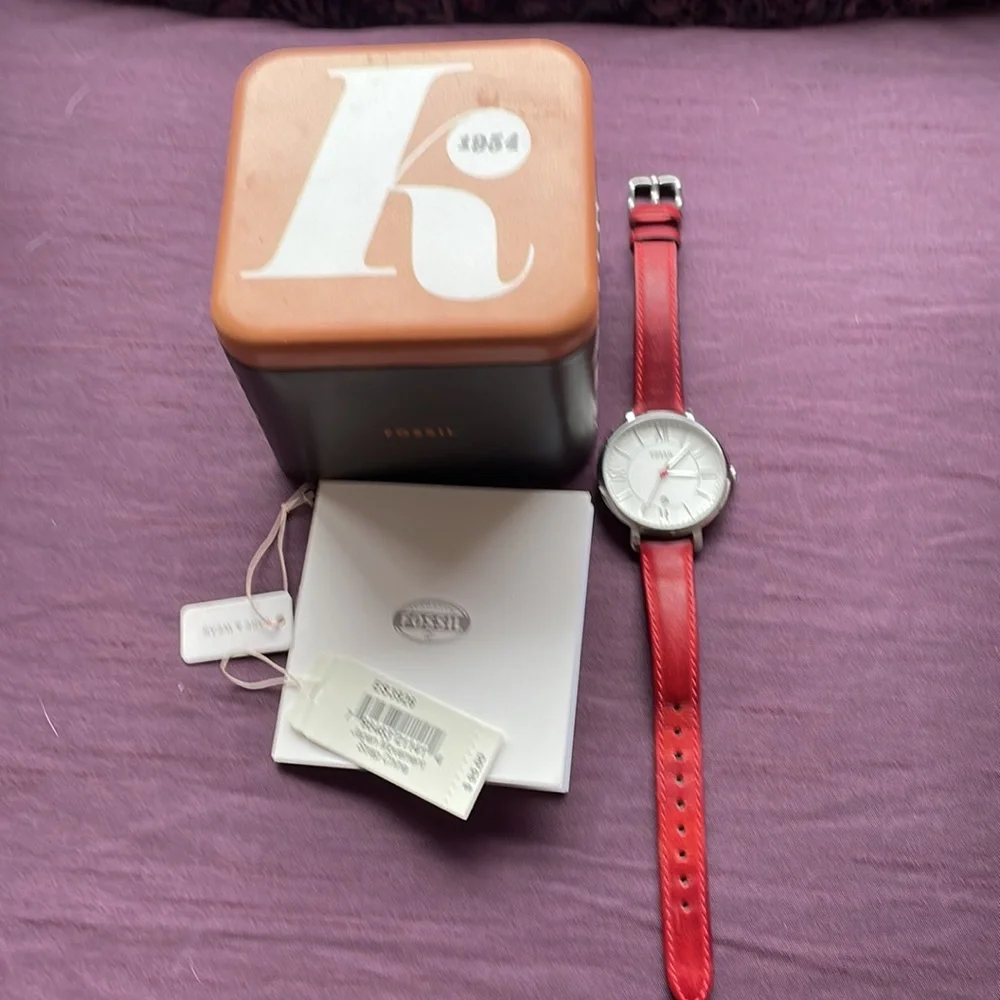 Fossil Watch with Roman numbers and date.